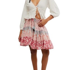 NWT Free People layered mini skirt with tassel.